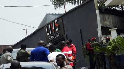 Police officers outside the Livs Night Club in Cameroon