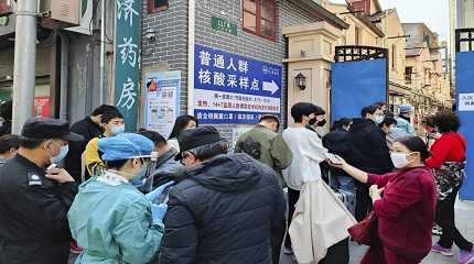 coronavirus tests outside a hospital in Shanghai