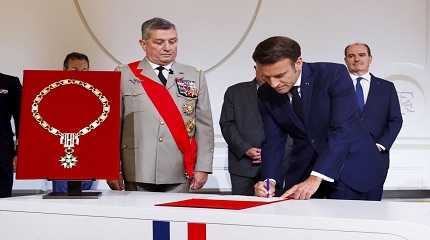 Benoît Puga and French President Emmanuel Macron