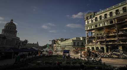 Rescue teams remove debris