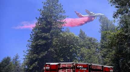 air tanker makes a large retardant drop