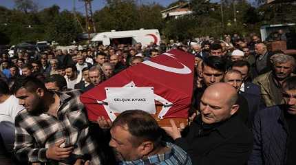 coffin of miners killed in a coal mine explosion