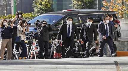 Investigators enter the headquarters