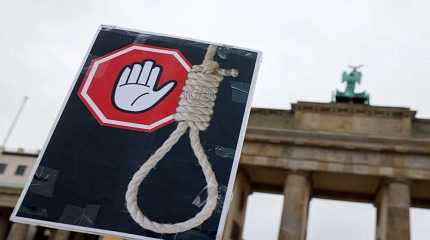 A placard is seen during a protest