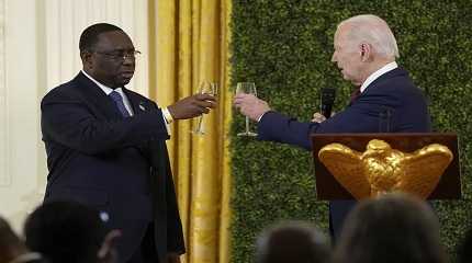 Joe Biden toasts with Macky Sall