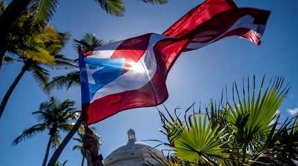 Puerto Rican flag in front of the Capitol building