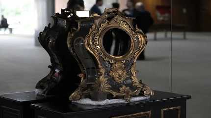 damaged 17th-century clock