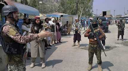 Pakistani soldier and Taliban fighters..