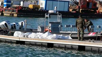 Tunisian coast guards covered bodies of refugees and migrants