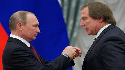 Vladimir Putin  awards Sergei Roldugin