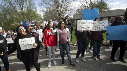 Protestors march in Kansas