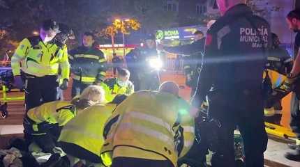 Rescuers work outside a restaurant