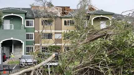 tornado flips cars and damages homes