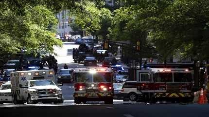 Police and emergency workers gather in Atlanta