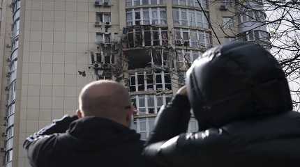 apartment building damaged by a drone