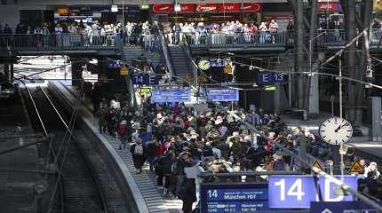 Numerous travelers wait for their train in Hamburg