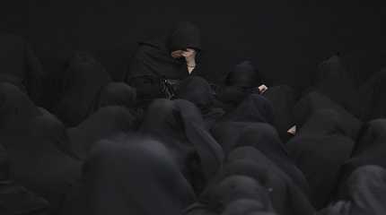 women attend the Ashoura mourning ritual