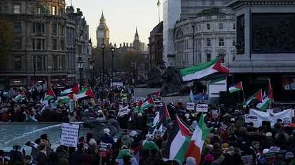 Protester hold flags in London