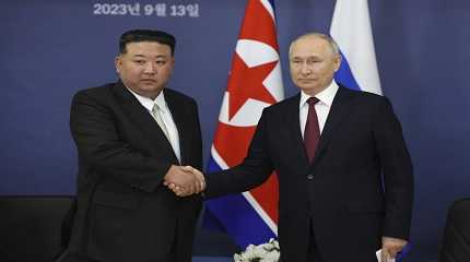 Vladimir Putin and Kim Jong Un