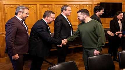 Volodymyr Zelenskiy is greeted by members of the Swiss National Council