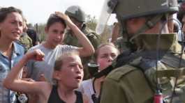  Palestinian Ahed Tamimi confronting Israeli soldier