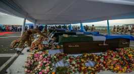 Peacekeepers attend a memorial service in DRC