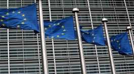 European Union flags fly outside the European Commission headquarters