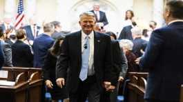 Idaho Gov. Brad Little leaves the house chambers