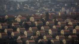 Israeli settlement in front of an Arab town