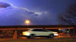 lightning streaks across the sky