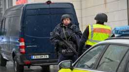 Police officers secure the area at a Christmas market