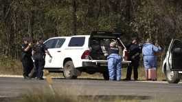 Police work near the scene of a fatal shooting