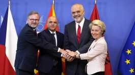 Ursula von der Leyen, Edi Rama, Dimitar Kovacevski and Petr Fiala shake hands prior to a meeting