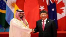 Xi Jinping shakes hands with Mohammed bin Salman