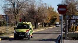 ambulance is seen coming out of the Air Force base