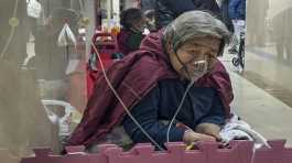 elderly patient using a ventilator