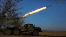 Ukrainian servicemen fire a BM-21 Grad