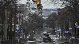 Ukrainian soldiers ride in Humvee 