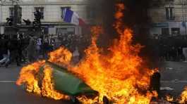 burning garbage cans during a demonstration