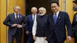 Anthony Albanese, Joe Biden and Narendra Modi are greeted by Fumio Kishida