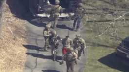 Jack Teixeira taken into custody by armed tactical agents