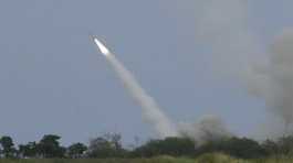 U.S. M142 HIMARS fires a missile during a Live Fire Exercise