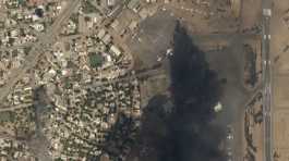 burning planes at Khartoum International Airport