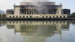 Smoke billows from the still smoldering Manila Central Post Office