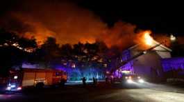 Firefighters extinguish a fire in the Donetsk university building