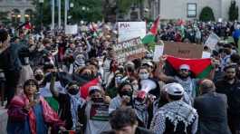 Palestinian students take part in a protest